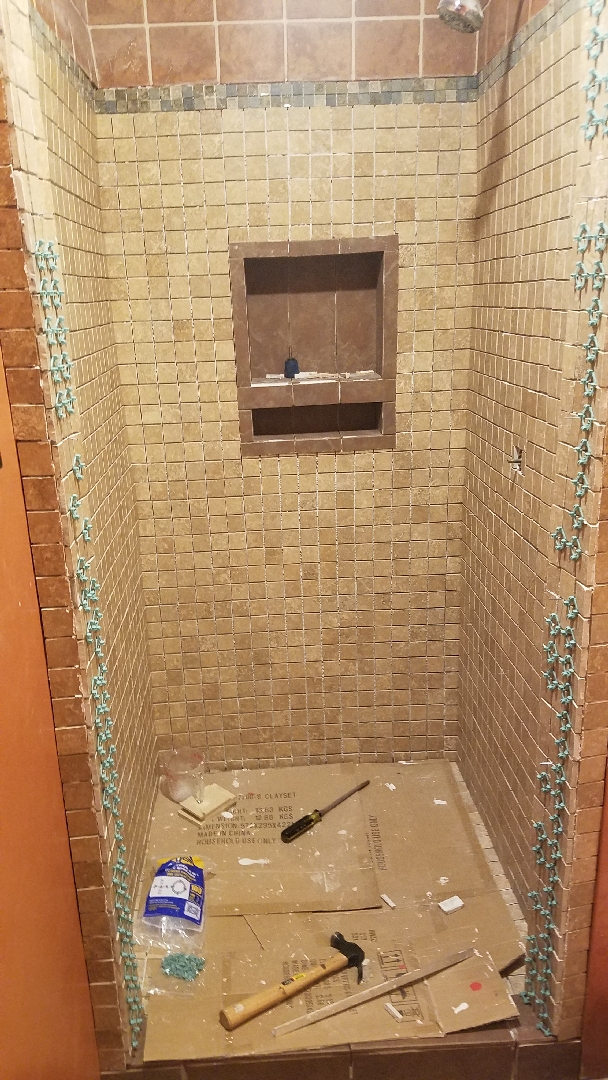 November 21, 2018: The entire inside tiled and the border being tiled.